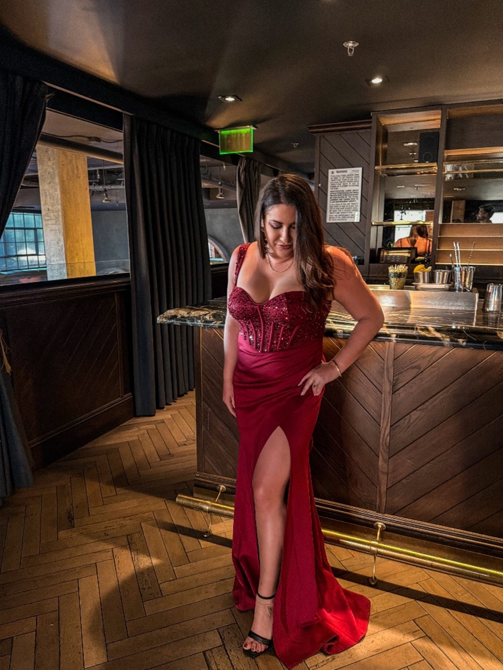 Red corset top floor length dress
